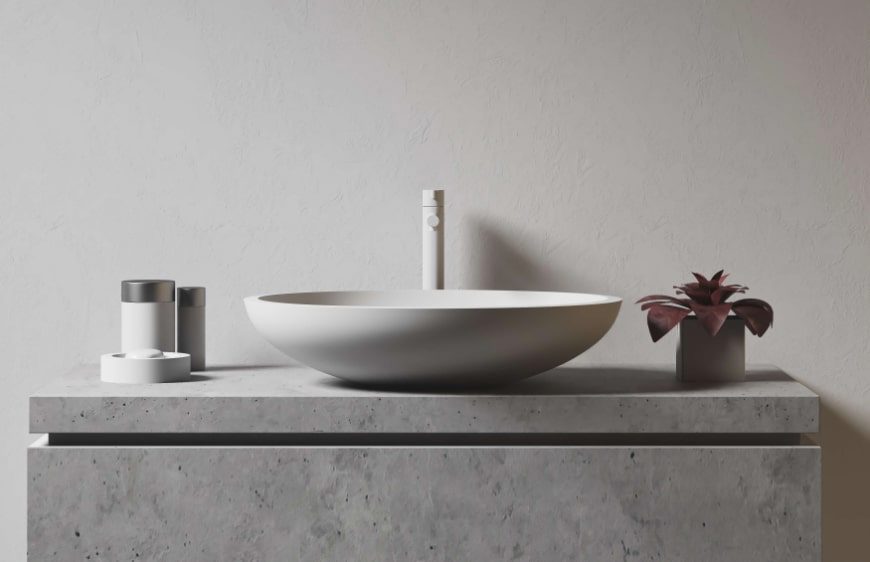 brut beton modern lavabo tezgahi, yuvarlak formlu lavabo ve beyaz armatur 